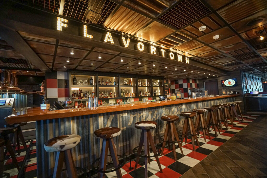 Stylish bar with wooden stools.